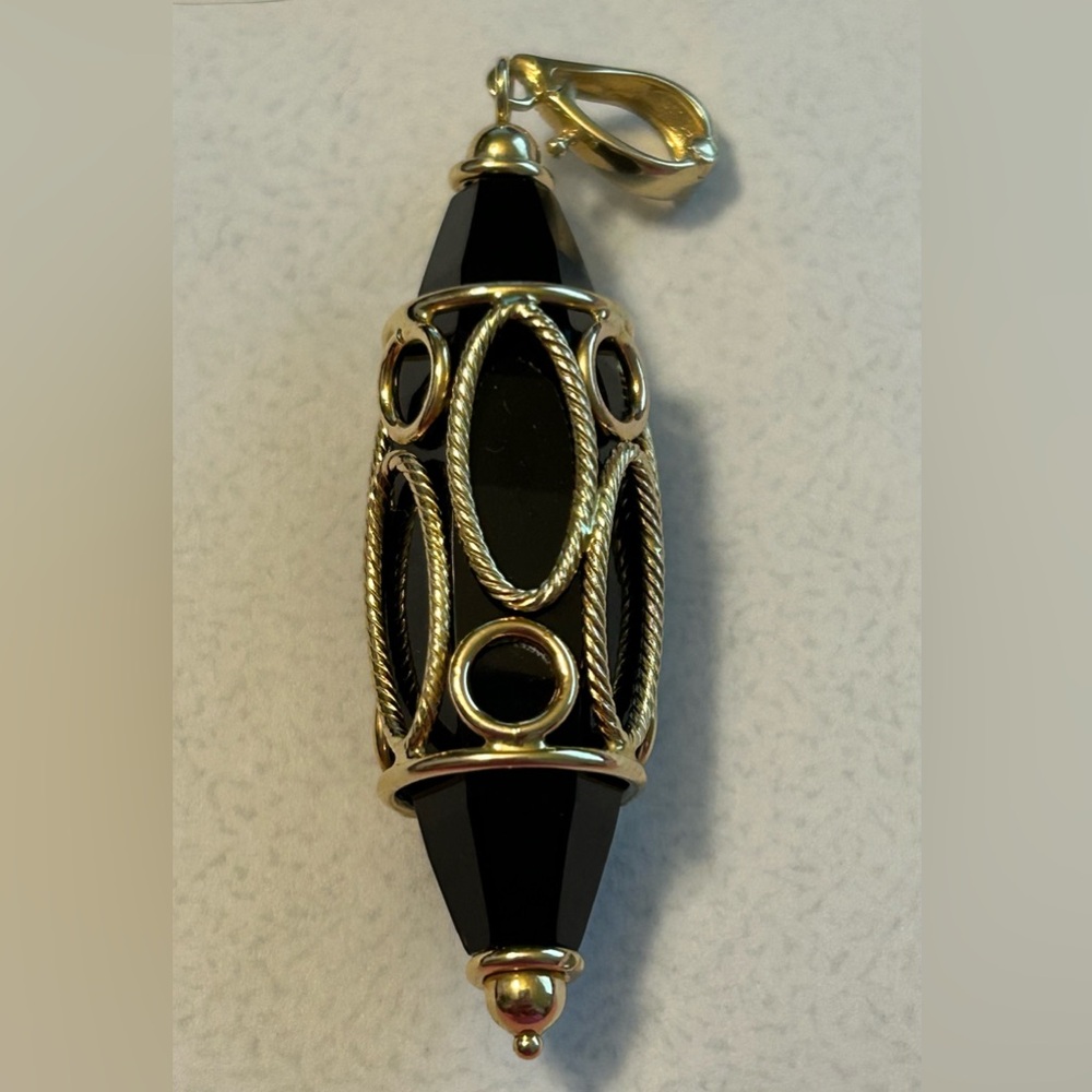 14K gold and onyx pendant. 2.5 inches long including bale by 5/8 of an inch